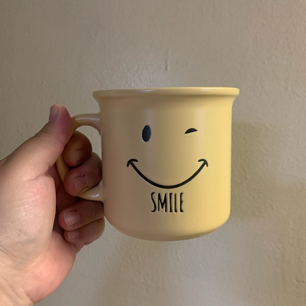 Yellow smiley face mug